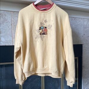 Adorable Sweatshirt with Embroidered Leaf Design